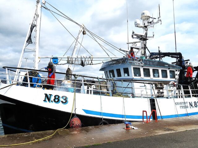 Fishing vessel Constant Friend, Scrubbing down alongside