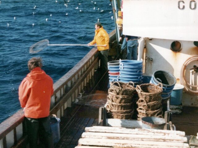 Fishing vessel Comet, Willie Anderson and Davie Johnson aboard Comet, at Out Skerries